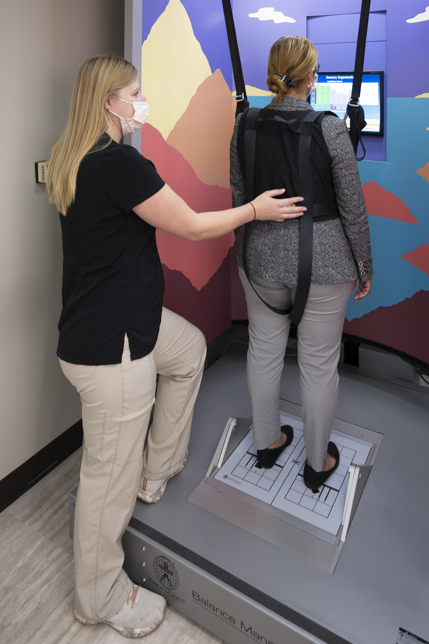 A patient being assisted by a health care provider at the Saint Luke's North Hospital-Smithville's rehabilitation department.