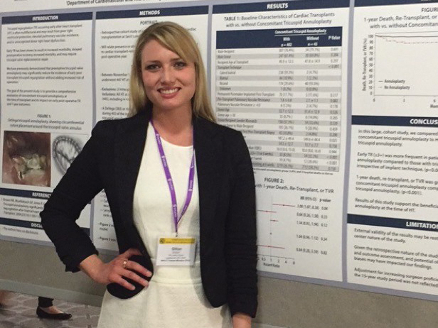 Dr. Dryton in front of her poster presentation