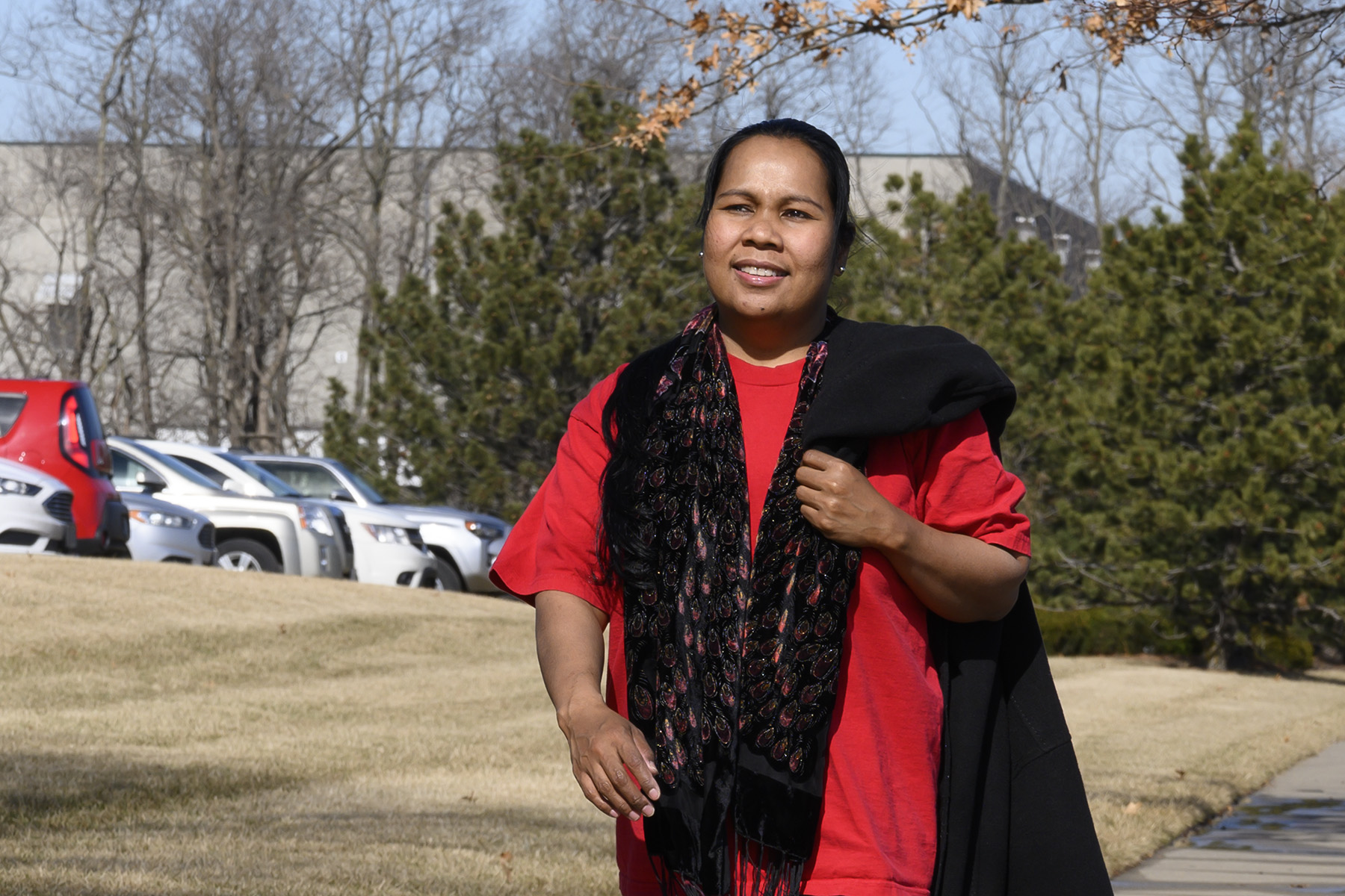 Portrait of patient, Jersita Samo walking outside