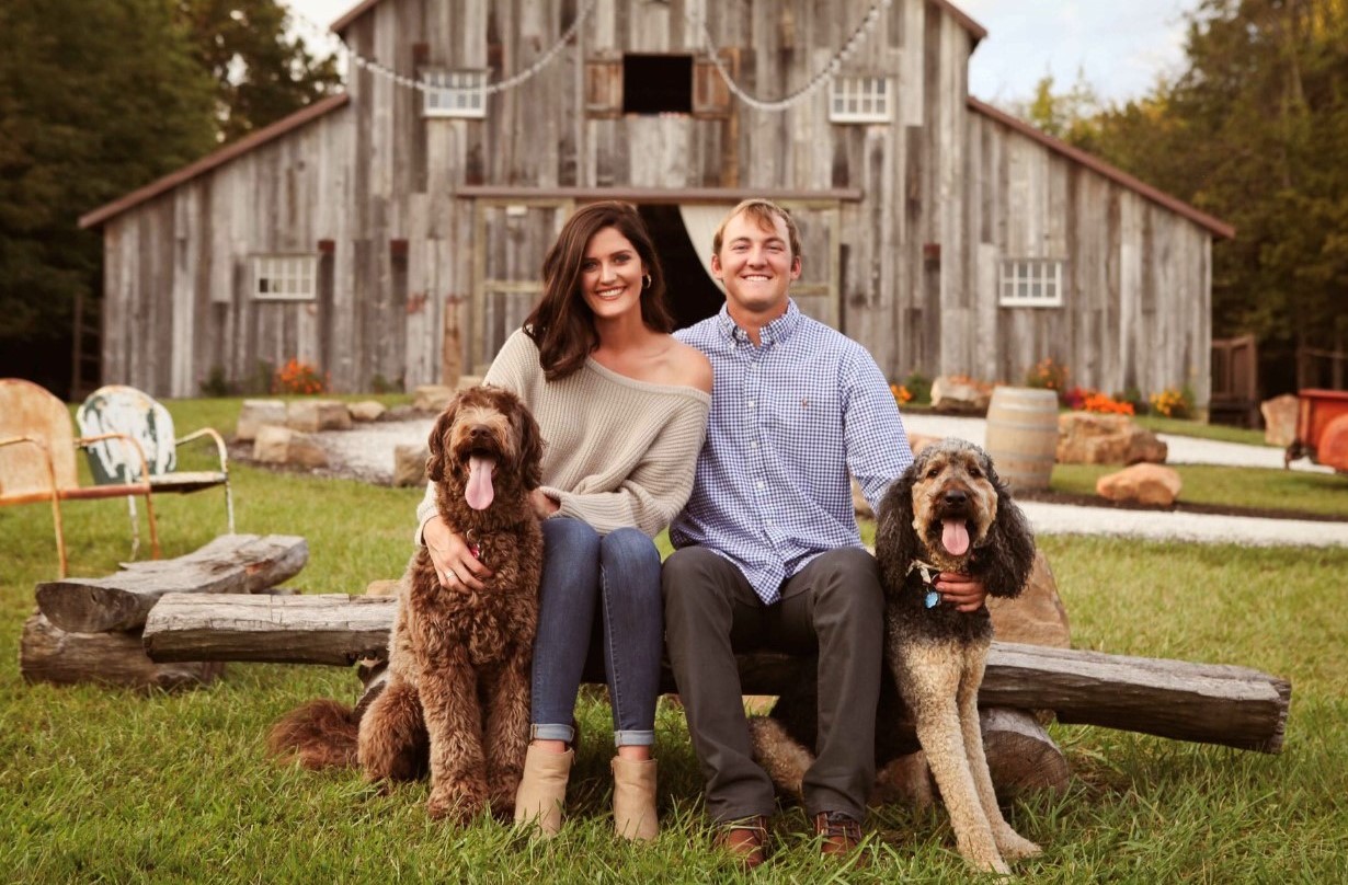 Erica Stone and her boyfriend with their two dogs