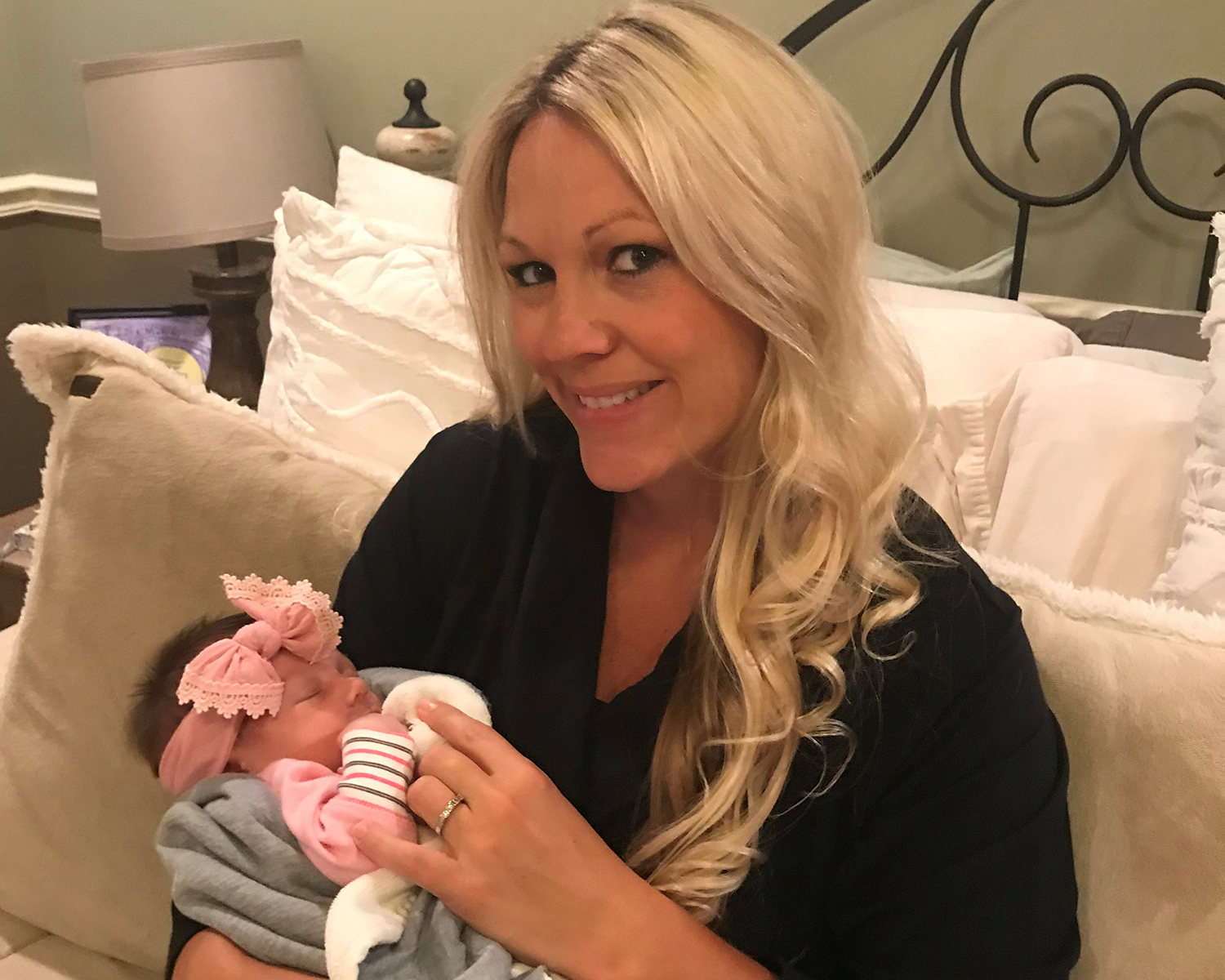 Chelsey Heston holding her baby, Vail