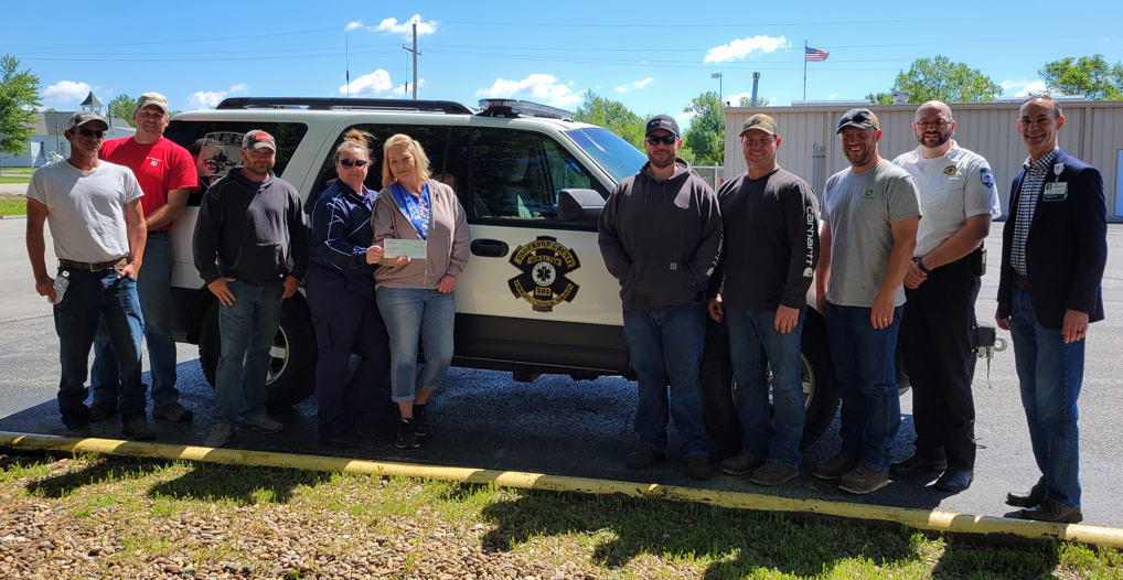 Jody Troyer, a field operations analyst with Southern Star Central Gas Pipeline’s Welda District, along with several Welda District employees, presented a check for $1,500