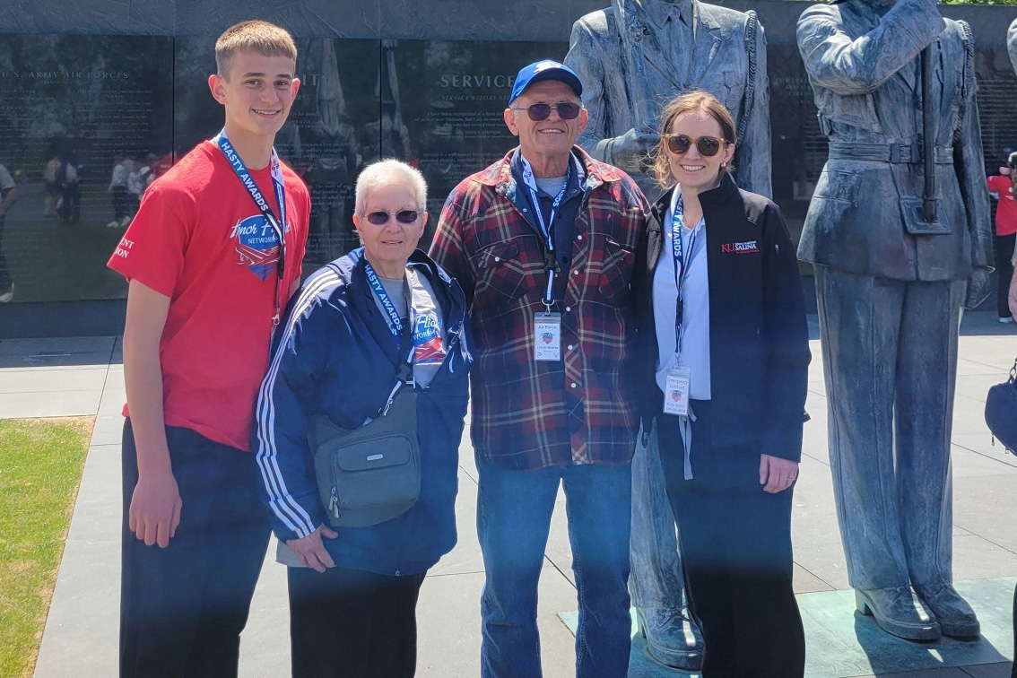Dr. Cecilia Mathis (right) with her Navy veteran parents, Capt. Barbara and Lt. Col. Lester Wuertz, and their grandson, Ben Wuertz