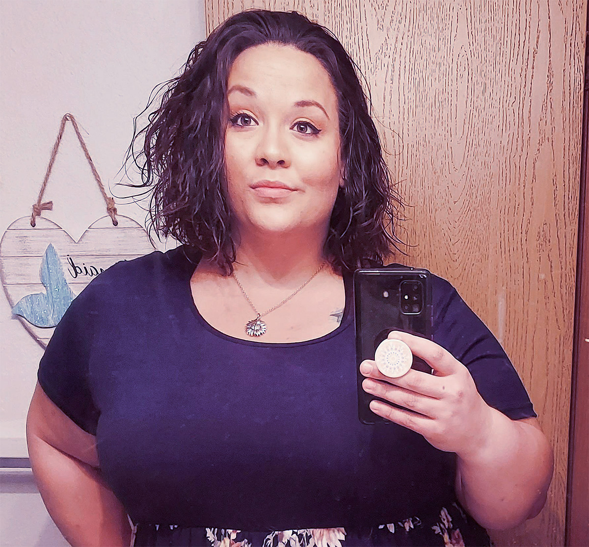 happy woman taking selfie