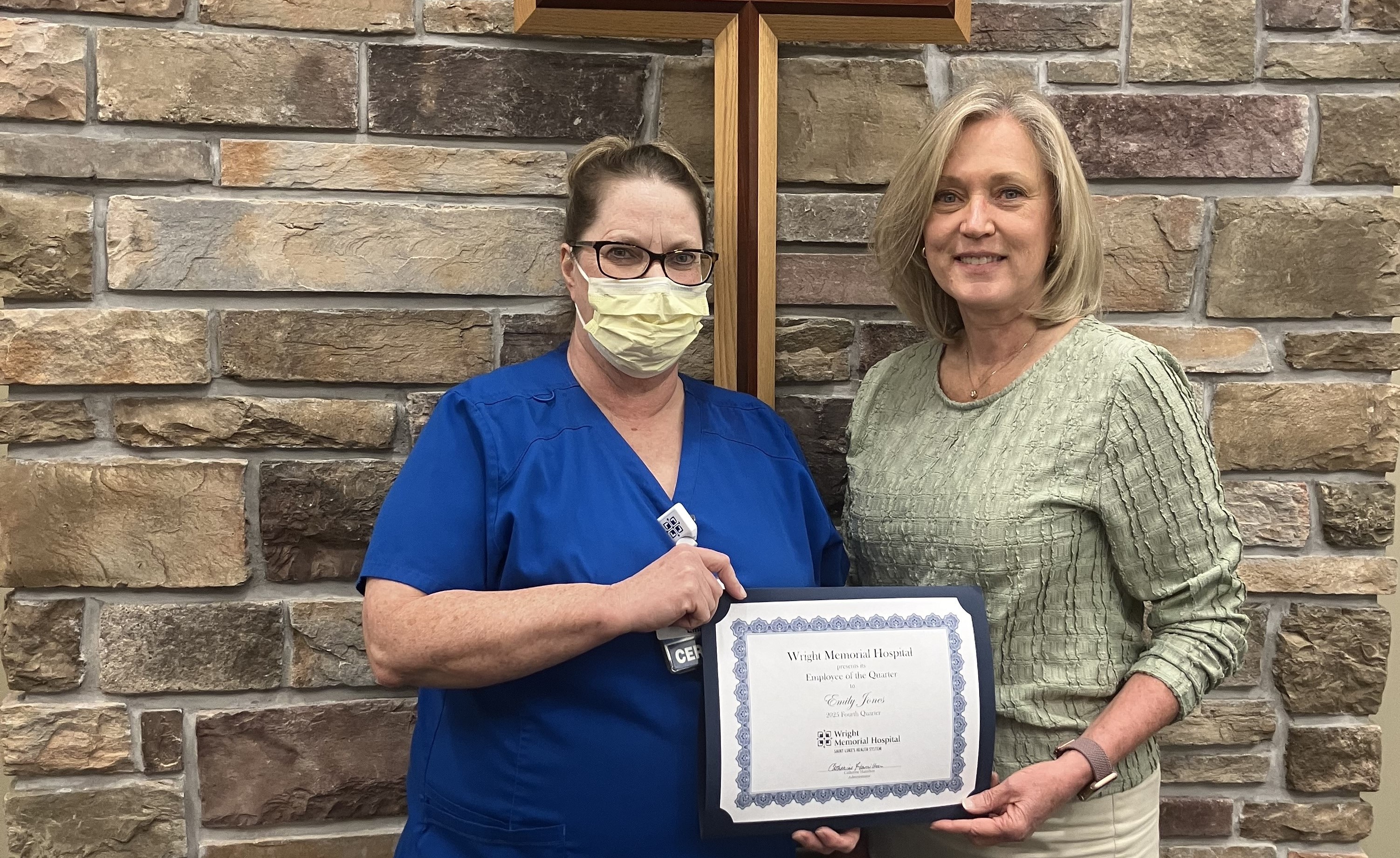 Emily Jones receives the Wright Memorial Hospital Employee of the Quarter Award for fourth quarter 2025 from Catherine Hamilton, administrator.