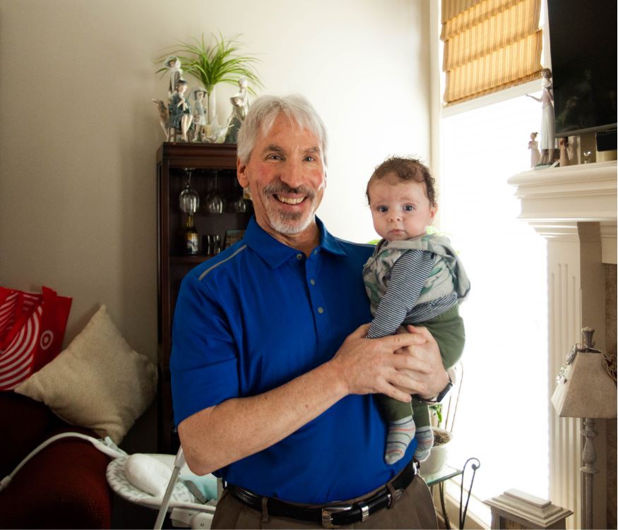 Ron Ricciardi holding his grandson